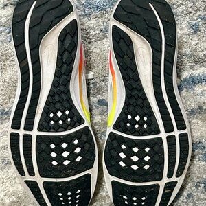 Nike Athletic Shoes with Black and Yellow Accents